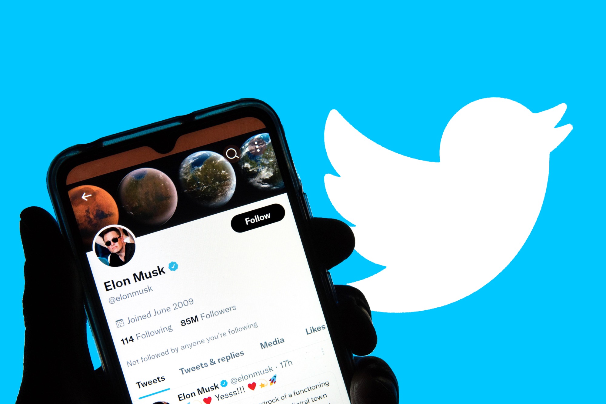 In this photo illustration, Elon Musk's twitter account is